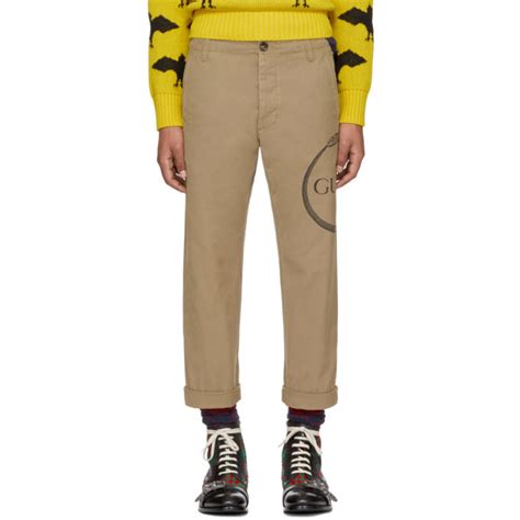 gucci beige ouroboros logo chinos|GUCCI .